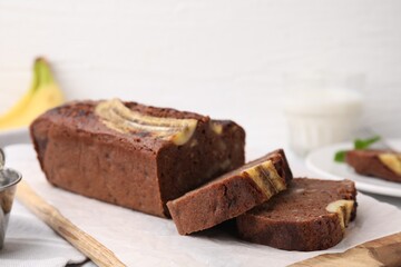 Delicious homemade banana bread on table, closeup