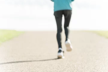 Foto auf Acrylglas ピンボケしたアスリートの走る後ろ姿のイメージ（マラソン選手・ランニング・ジョギング）  © buritora