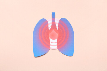 Paper lungs on beige background