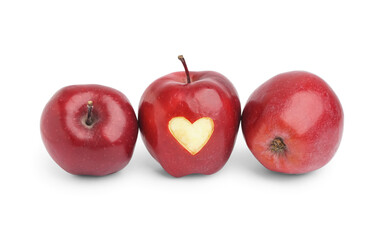 Fresh red apple with carved heart on white background