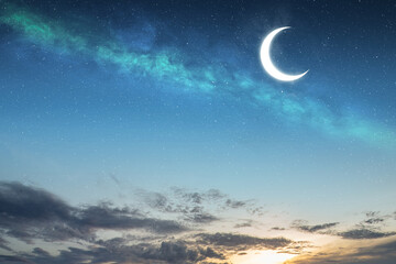 View of the crescent moon and starry sky in the night