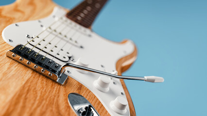 Close-up photo of an electric guitar.