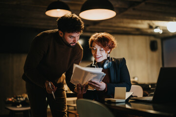 Confident business people analyzing market data for global expansion and profitability. Creative office collaboration and late night work for successful strategic planning.