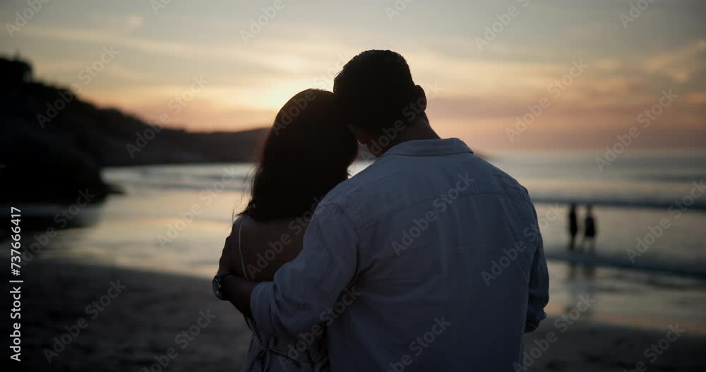 Poster Sunset, back and couple at beach for love on holiday, travel or summer vacation on valentines day date. Rear view, man and woman at ocean together for connection, hug and relationship at sea outdoor