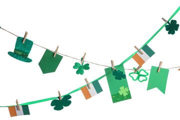 Paper garland with clover, leprechaun hat and Irish flags for St. Patrick's Day celebration on...