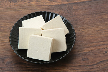 Tahu or Tofu, one of raw ingredient food made from fermented soybean extract. 
