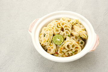 Seblak, stir fried crackers with garlic and chilli. Indonesian traditional food
