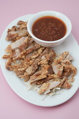 Crispy chicken cutlet with chilis sauce