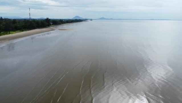 View of a quiet beach, with a beautiful stretch of sand in Pagatan