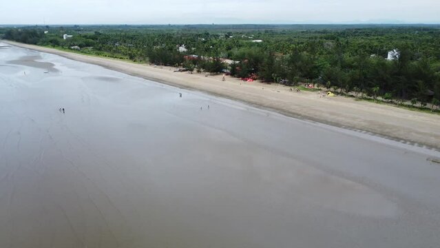 View of a quiet beach, with a beautiful stretch of sand in Pagatan