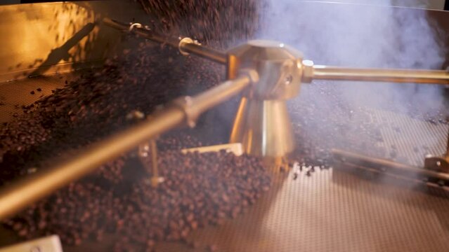 High quality specialty coffee roaster. Slow motion shot.
