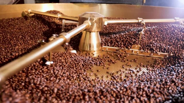 High quality specialty coffee roaster. Slow motion shot.