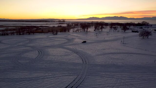 4k Aerial Drone Snow-Capped Mountains Overlooking Willard Bay, Utah