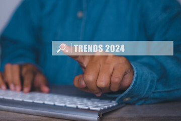 Businessman searching 2024 trend for business marketing planning target.