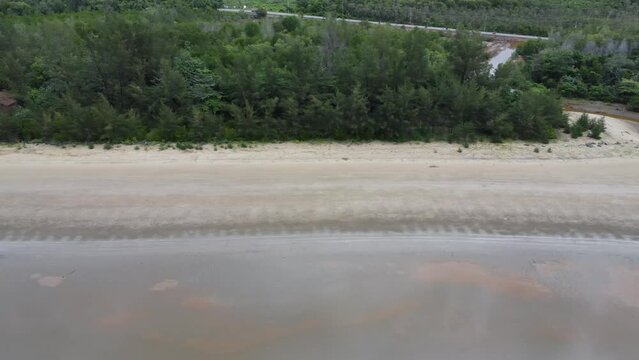 View of a quiet beach, with a beautiful stretch of sand in Pagatan