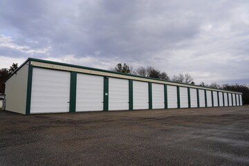 Green and Tan storage units holding the owner's property.