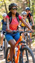An American family takes a walk in the autumn forest on bicycles.