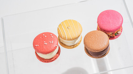 A french sweet delicacy, macaroons variety closeup.macaroon colourful on white background.