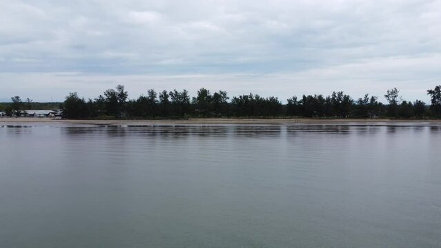 View of a quiet beach, with a beautiful stretch of sand in Pagatan