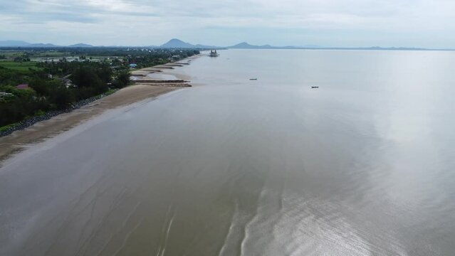 View of a quiet beach, with a beautiful stretch of sand in Pagatan