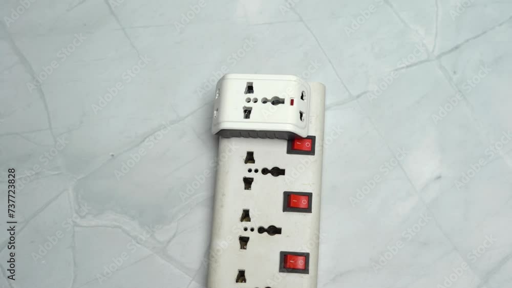 Poster multi plug power adapter testing in spy guard closeup view