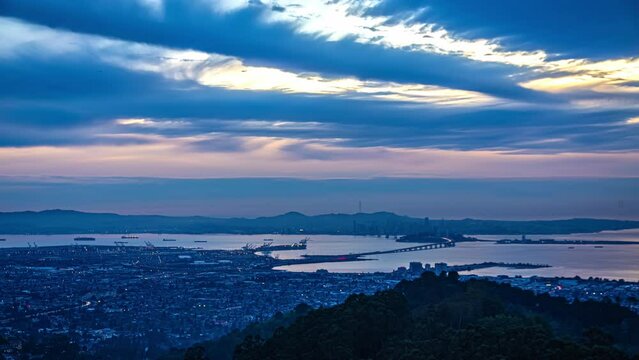 Evening to night timelapse of Berkeley city in Northern California and San Francisco Bay California, USA 