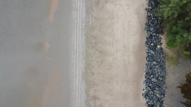 View of a quiet beach, with a beautiful stretch of sand in Pagatan