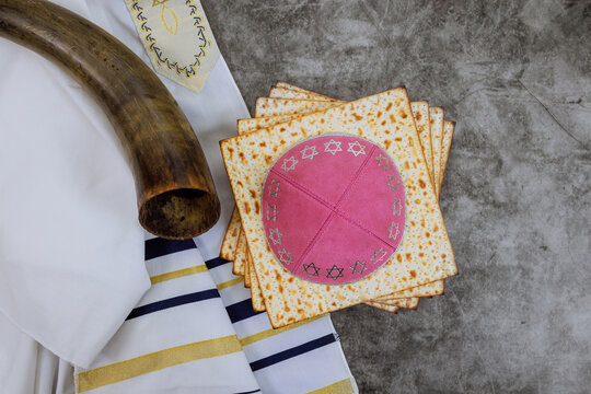 Passover ritual includes Matzah, unleavened bread, is symbolized Pesach celebration kippah tallit