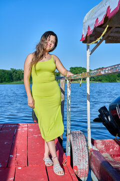 Green Apple dress, latina with blue sky and posing, gesture, smiling