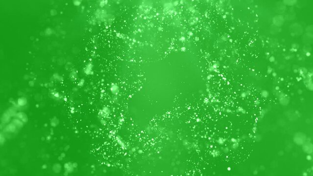 Sparkling particles on green screen background