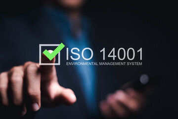 ISO 14001 concept. Identify, control and reduce the environmental impact of activities. Businessman...