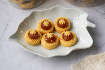 Popular cookies in Malaysia during celebration of Eid Mubarak (Hari Raya) on white background and selective focus.