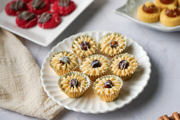 Popular cookies in Malaysia during celebration of Eid Mubarak (Hari Raya) on white background and selective focus.