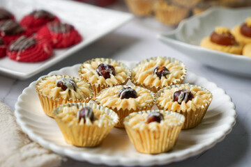 Popular cookies in Malaysia during celebration of Eid Mubarak (Hari Raya) on white background and selective focus.