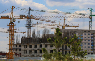 Fototapeta premium Construction of a residential complex in Almaty in Kazakhstan. August 22. 2015