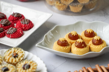 Popular cookies in Malaysia during celebration of Eid Mubarak (Hari Raya) on white background and selective focus.