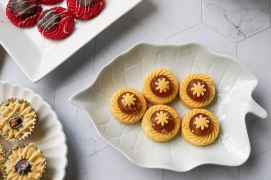 Popular cookies in Malaysia during celebration of Eid Mubarak (Hari Raya) on white background and selective focus.