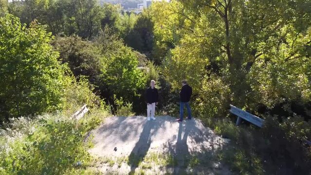 end of the road car stopped on broken down bridge with two people being lost