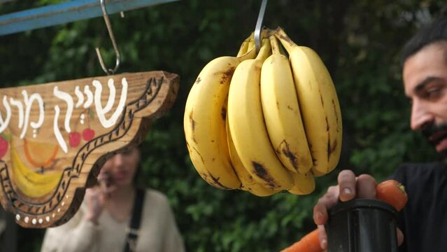 Impromptu seller of all kinds of antiques and bananas