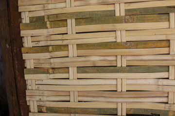 bamboo that is split thinly and then woven into walls, usually used in rural areas