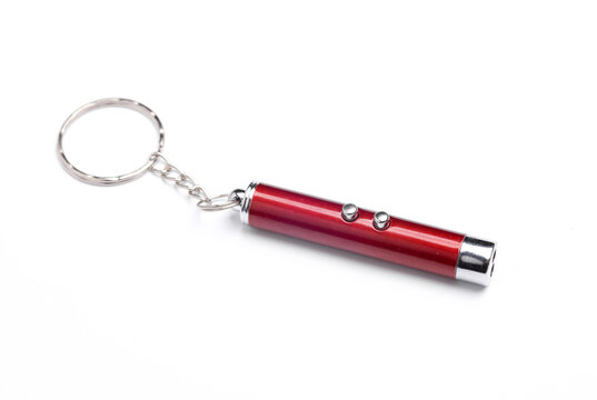 Laser pointer flashlight on white background