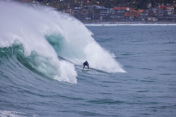 Huge waves and paddle boarding