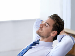 Man, eyes closed and calm breathing in office for stress management, relief and balance for peace while working. Businessman, relax and moment in workplace for wellness break for corporate work