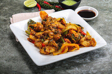 Vietnamese cuisine - fried frog with vegetables