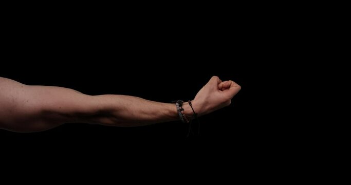 Hand gestures with alpha channel. Seductive "come her" gesture, muscular male arm wearing wristbands, rear side