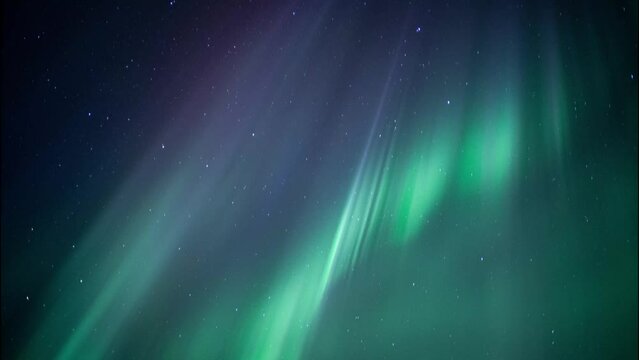 Real time colorful Aurora Borealis dancing in with starry sky in the background Tilt down shot