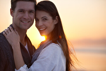 Obraz premium Couple hug, portrait and sunset on beach, travel for bonding and romance outdoor with love and trust. Happiness, support and loyalty with people in relationship, mockup space and adventure together
