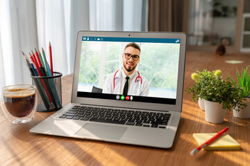 Fototapeta na wymiar Doctor video call online by modish telemedicine software application for virtual meeting with patient