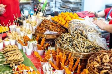 Street food at a local market in the city of Manila in Philippines.
