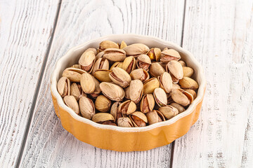 Salted tasty pistachio nuts heap